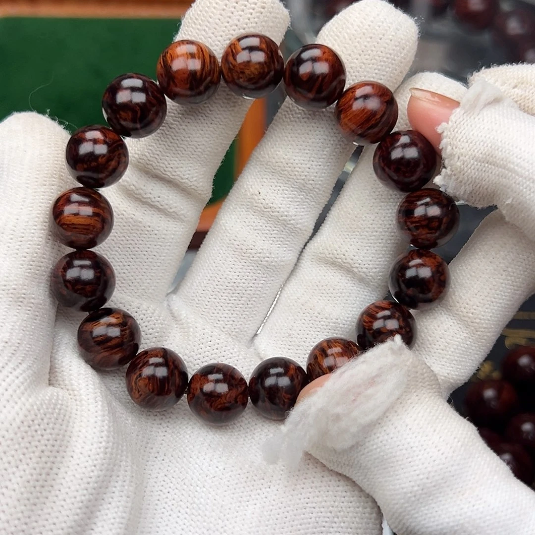 莫***埃木1.2海南红降黑金满纹精品