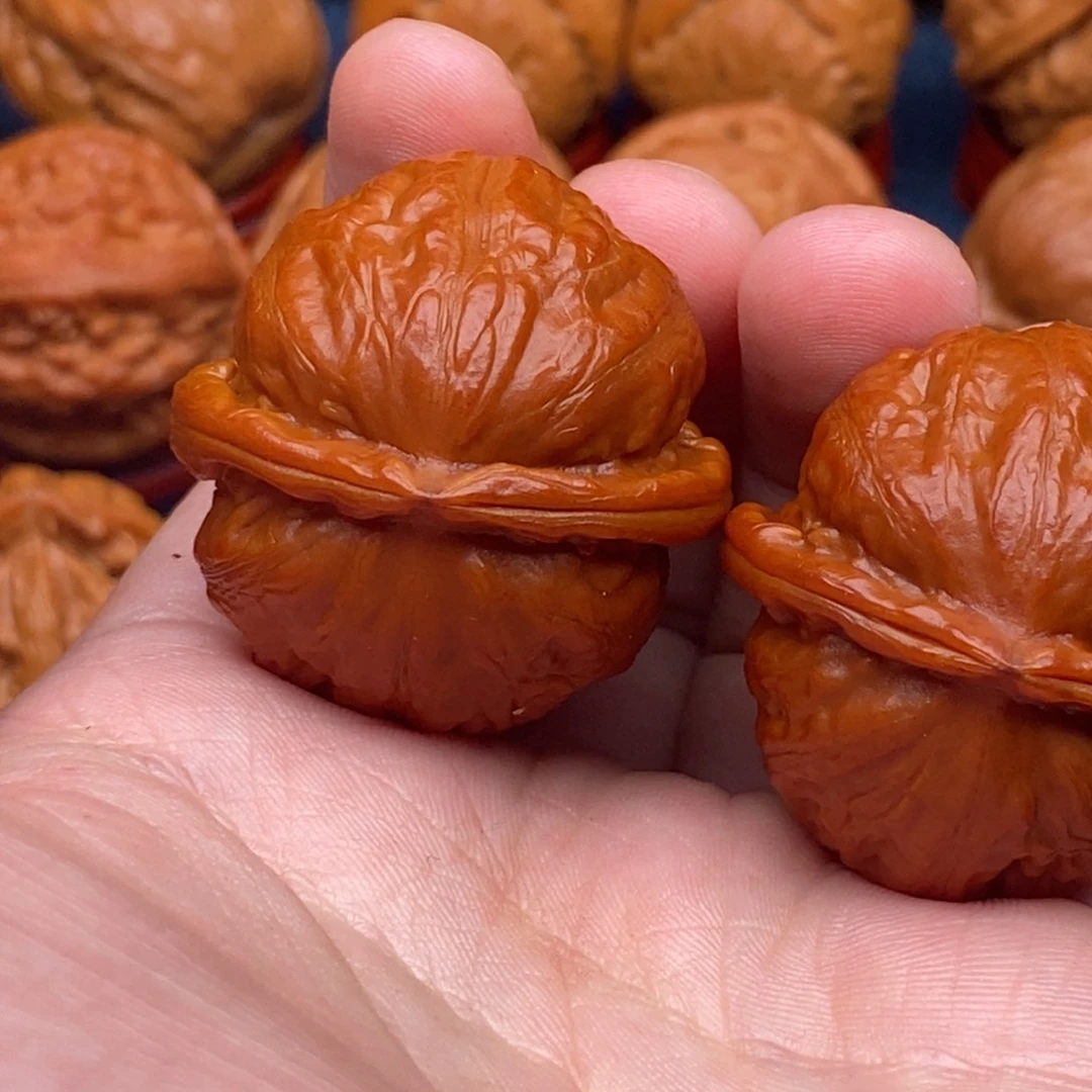 文玩核桃把件张**。精品小手捻