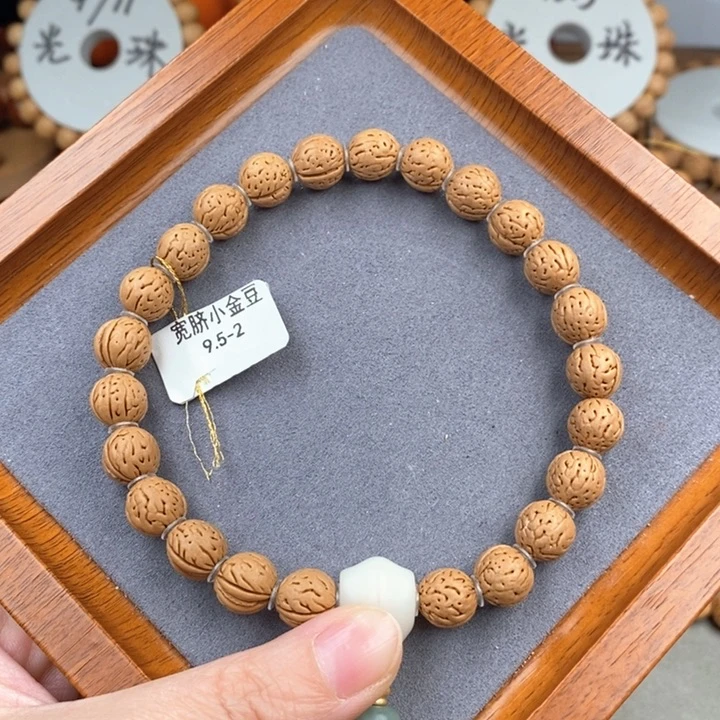 桃核手串宽脐小金豆9.5-2头尾微修抛光尺寸误差0.5之间