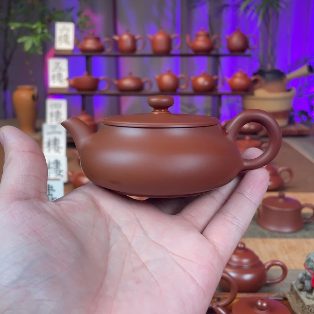 紫砂潮州手拉壶峯**影精工明炉