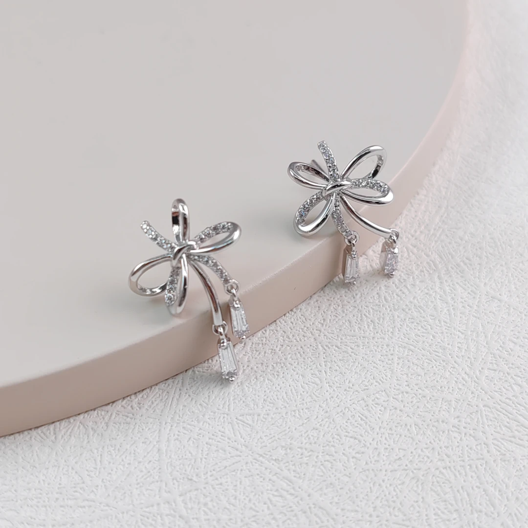 XUPING/旭平首饰 合金合成锆石耳饰 设计感蝴蝶结 GDJ X001062602