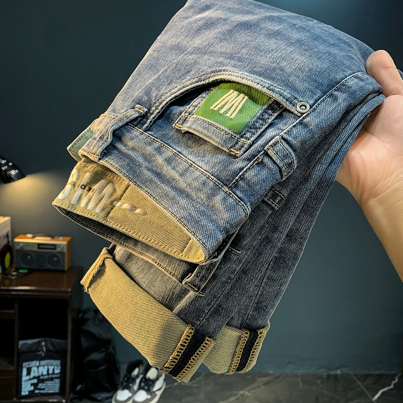 高端男士牛仔裤2025年夏季新款修身小脚裤刺绣潮流休闲哈伦男裤子