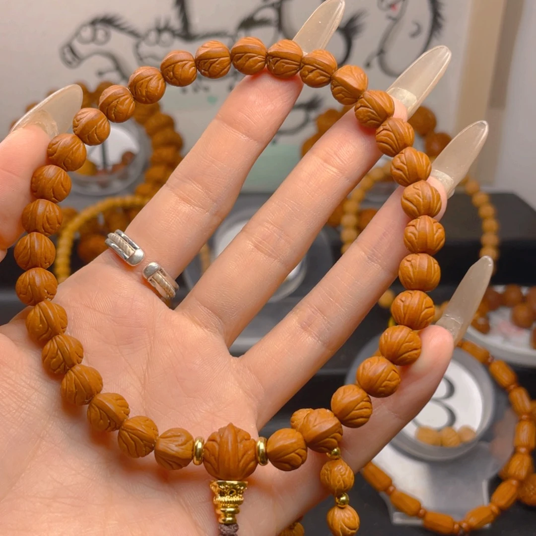 L***｀文玩核桃吊坠0.8888888888