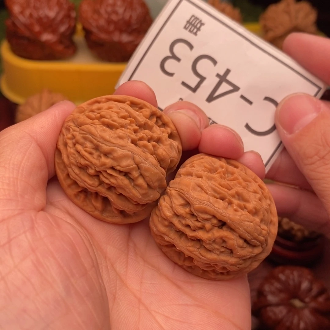 桃核把件九龙34…..