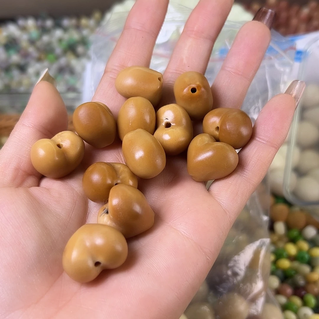 菩提根/象牙果吊坠瑕疵咖爱心10颗有裂