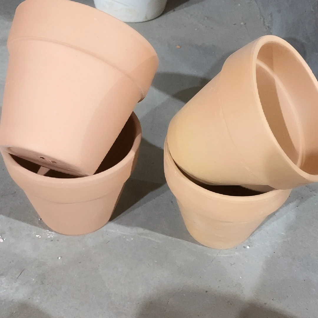 张***升瑕疵红陶012-4