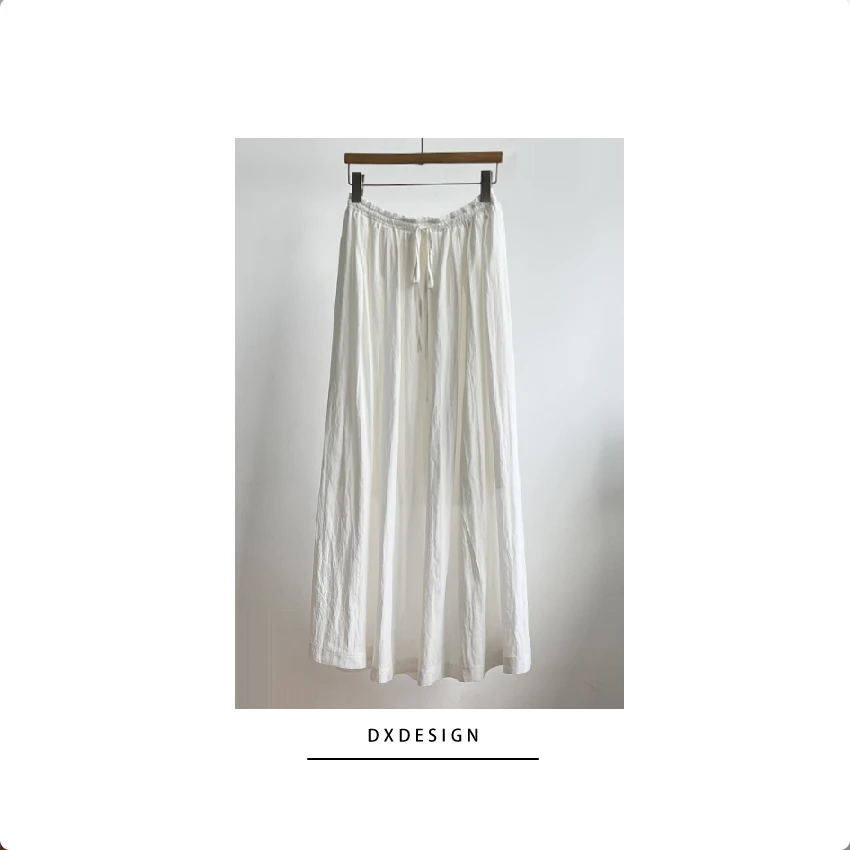 轻奢解构艺术剪裁 气质白色半身裙女大裙摆设计感褶皱A字长款伞裙