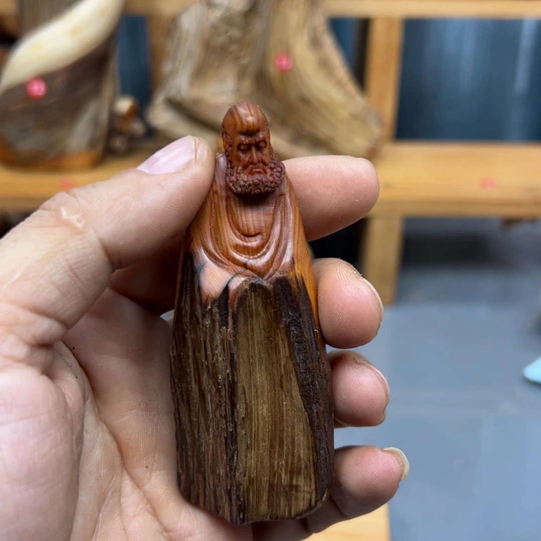 鸽***缘木崖柏木摆件手把件