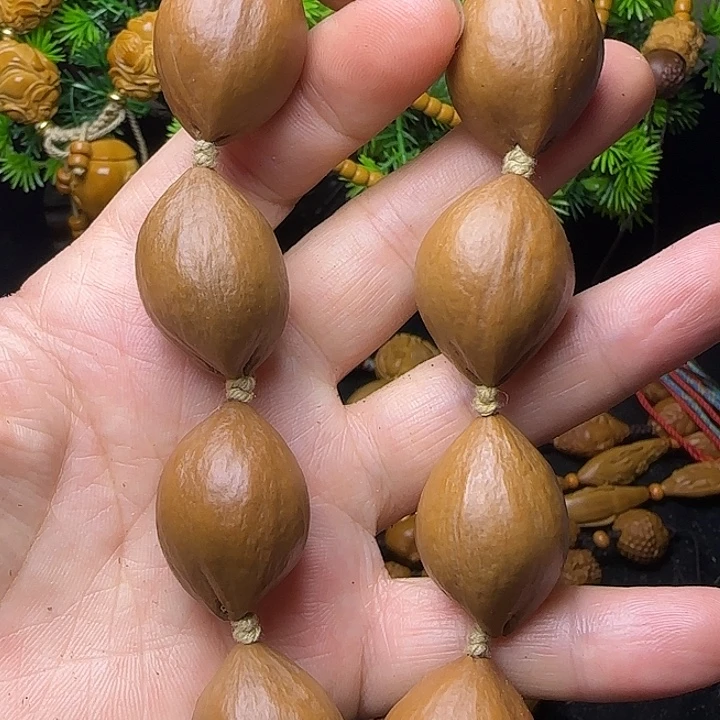 橄榄核雕刻手串素