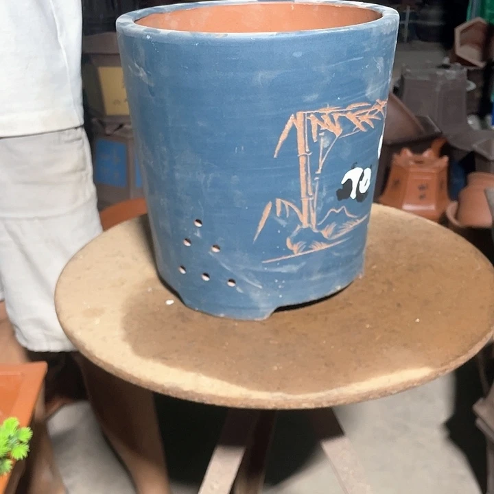 蓝色刻绘熊猫大花盆