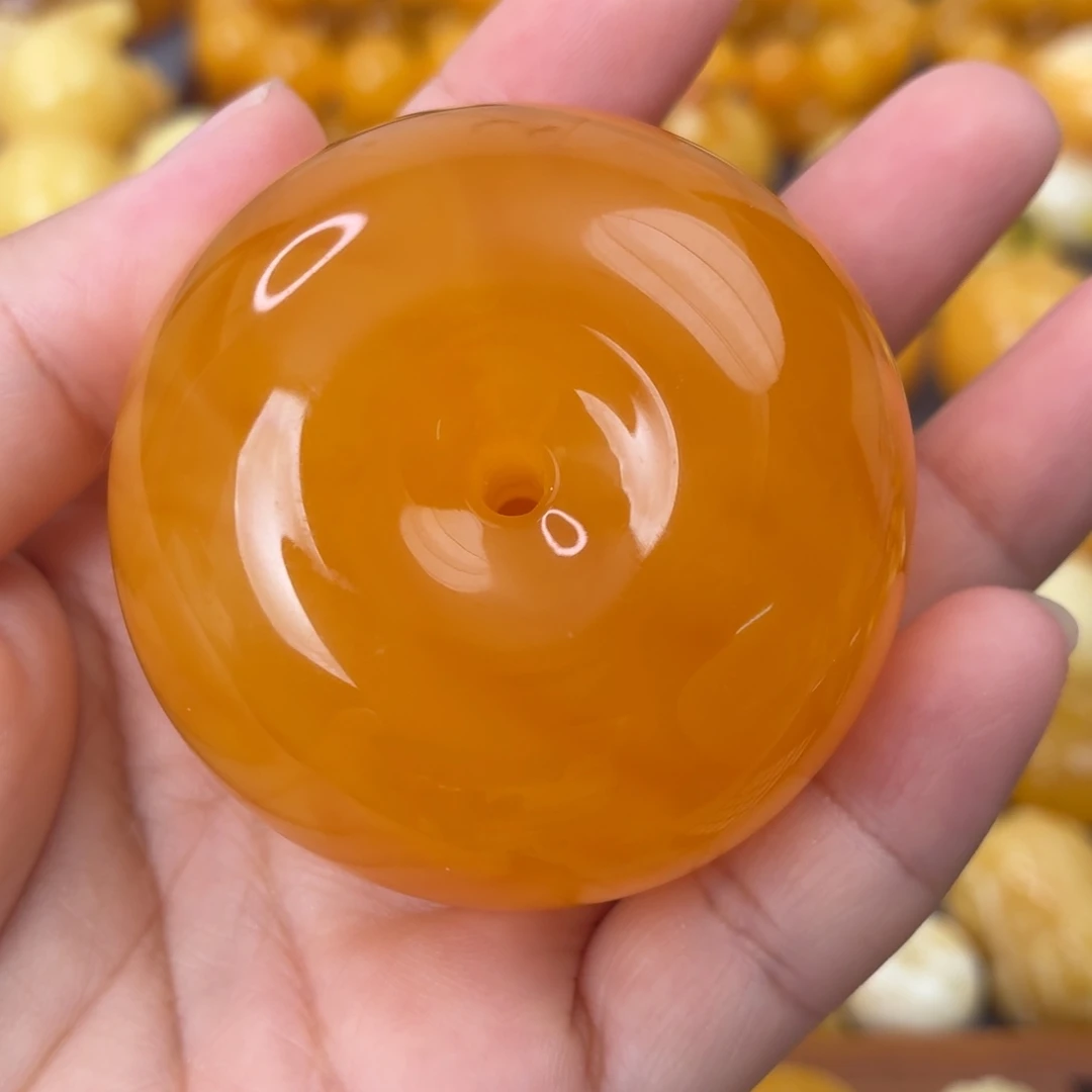 裸石虫珀未镶嵌橘红扣