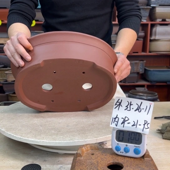 江***人紫砂花盆中香薰和茶