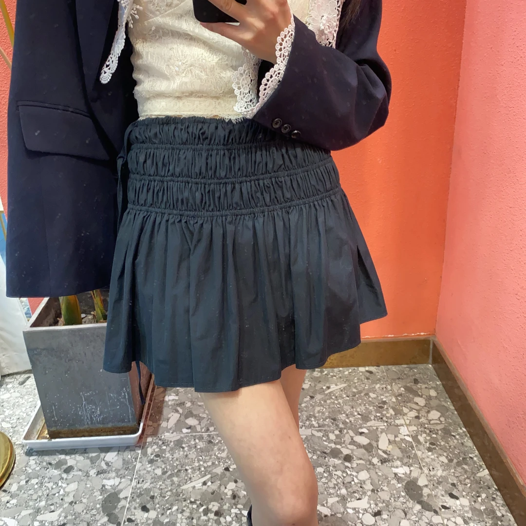 （默茗服装）纯色松紧腰短裙