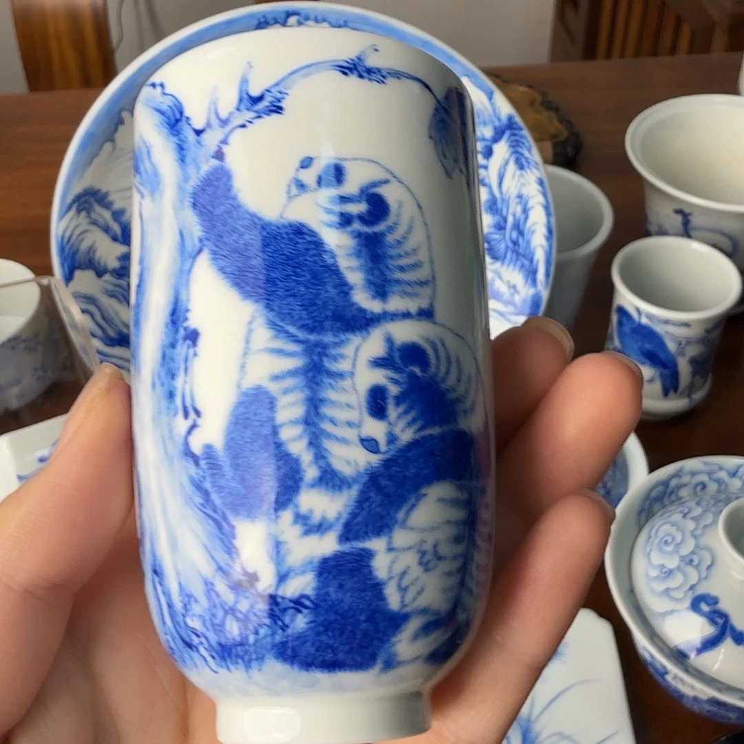 軍***，盉木      熊猫杯。