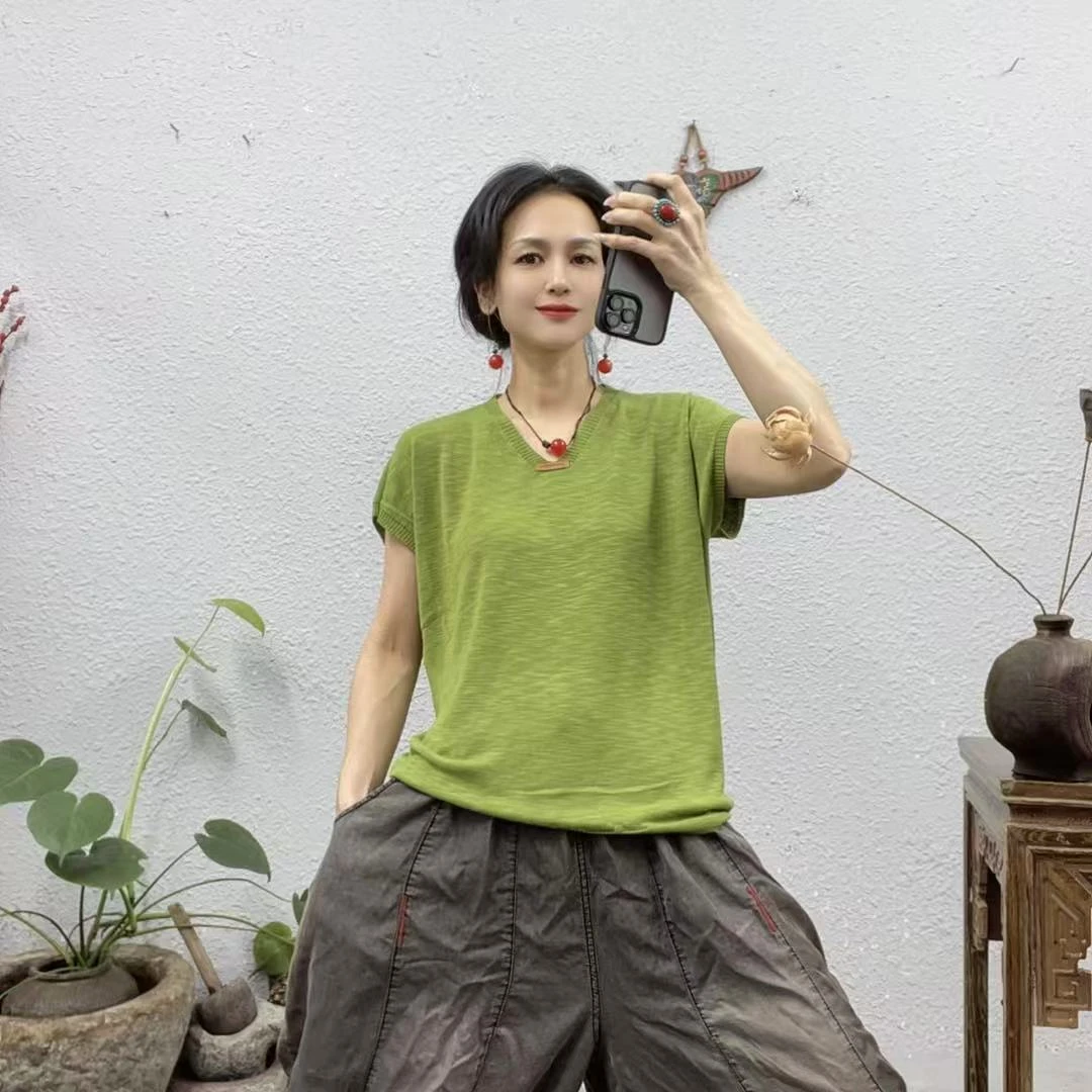 3189砍袖领口贴标V领针织线上衣（长60胸围116