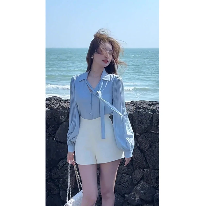 冷淡系独特别致套装2025春季新款御姐气质宽松系带衬衫白色短裤女