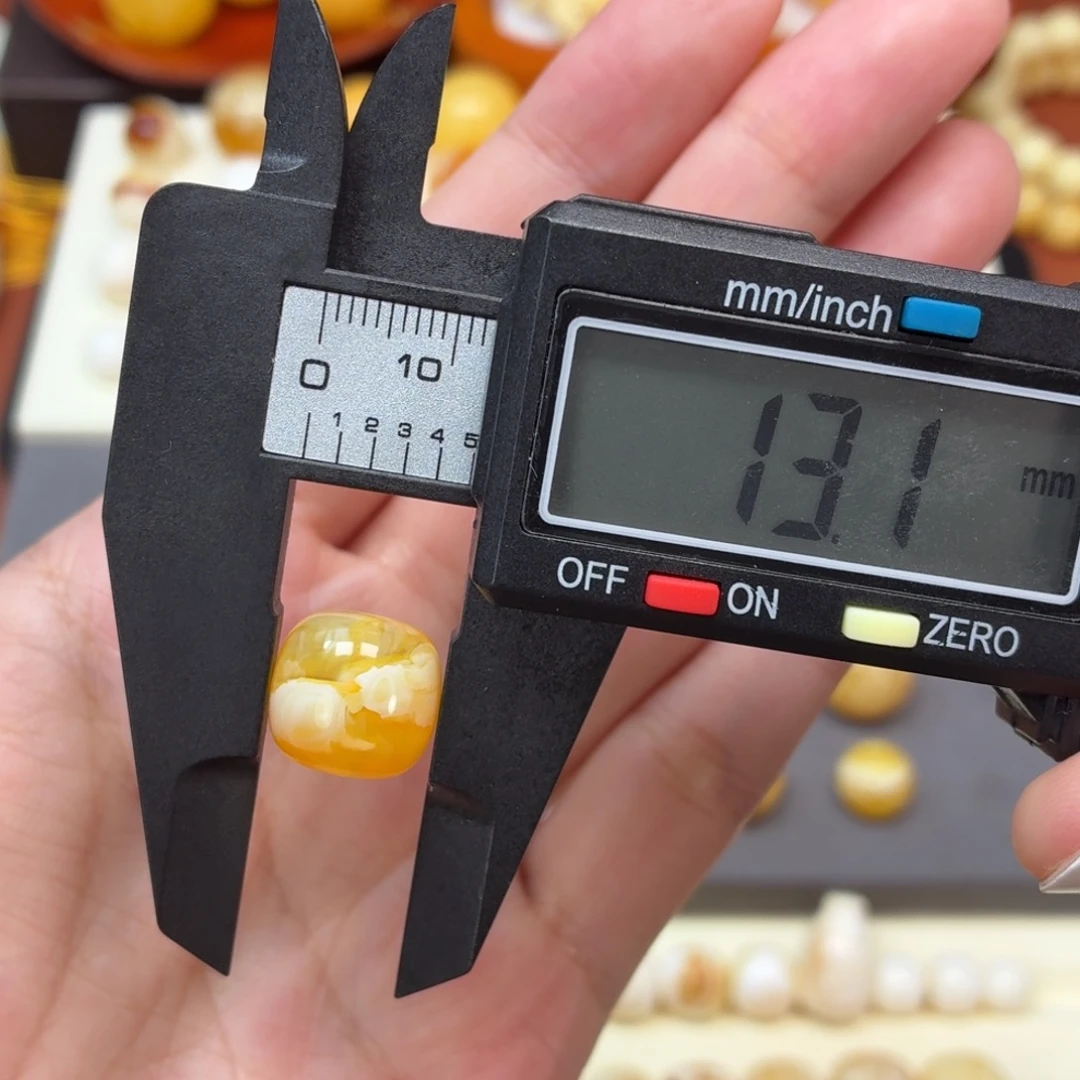 琥珀未镶嵌珠宝奇石焦皮金橘白溶洞荧光老型13mm