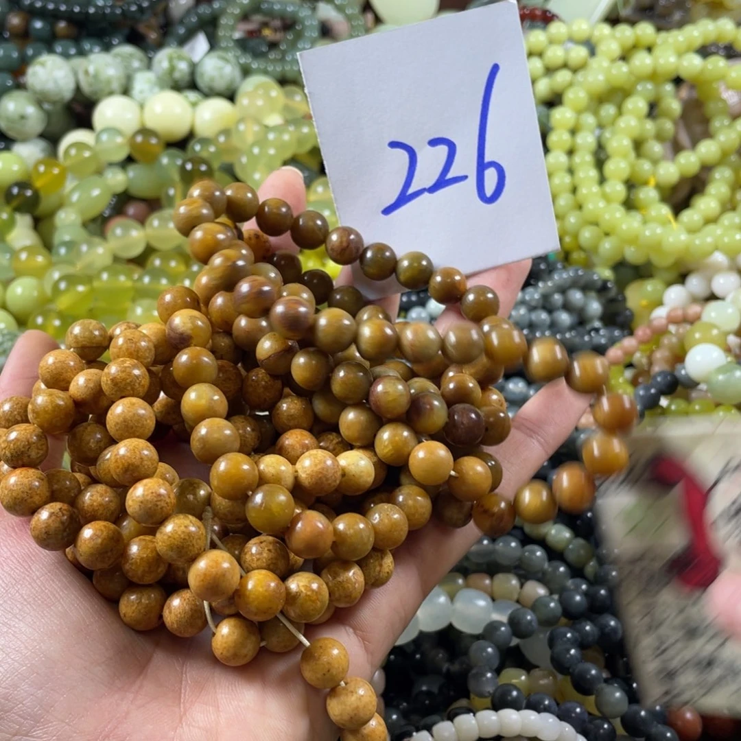 一***堂蛇纹石玉未镶嵌手串