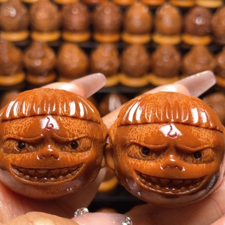 橄榄核把件不****脑橄榄雕刻