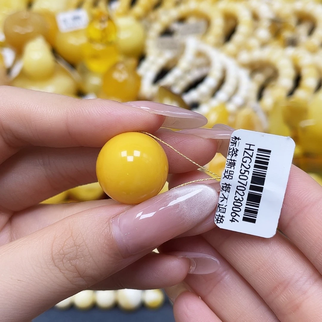 彭***晏蜜蜡未镶嵌裸石圆珠18mm