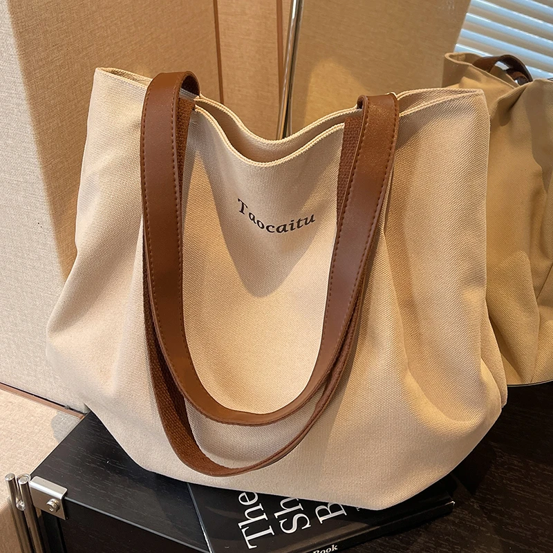 学生休闲帆布包包女2025新款潮百搭妈咪托特包百搭大容量购物袋包