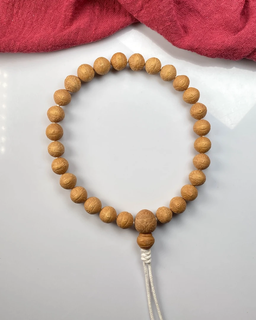 尼泊尔12mm小凤眼菩提27颗手持黄皮金眼