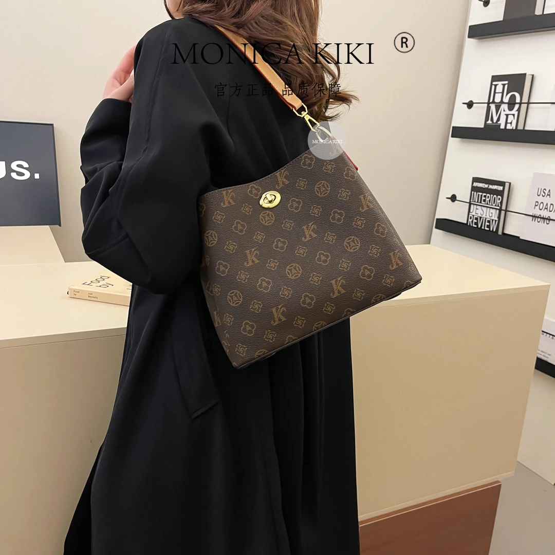 轻奢百搭斜挎包时尚潮流印花单肩包复古休闲气质水桶包99108