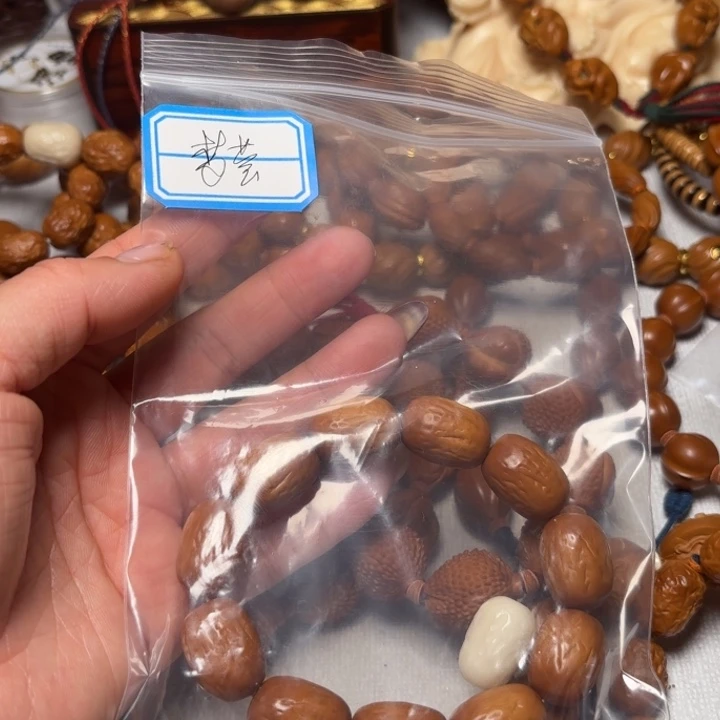梦***莹手串/手链橄榄核1.5奶枣