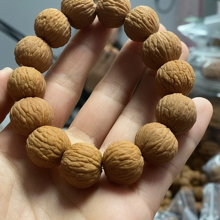 文玩核桃把件凤羽手串
