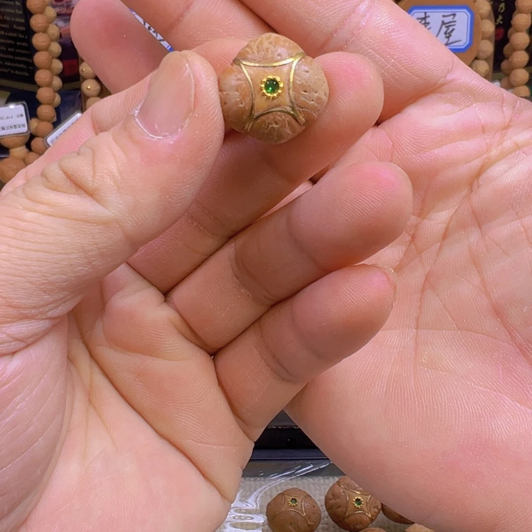 ****7手串凤眼菩提镶嵌麒麟眼三通