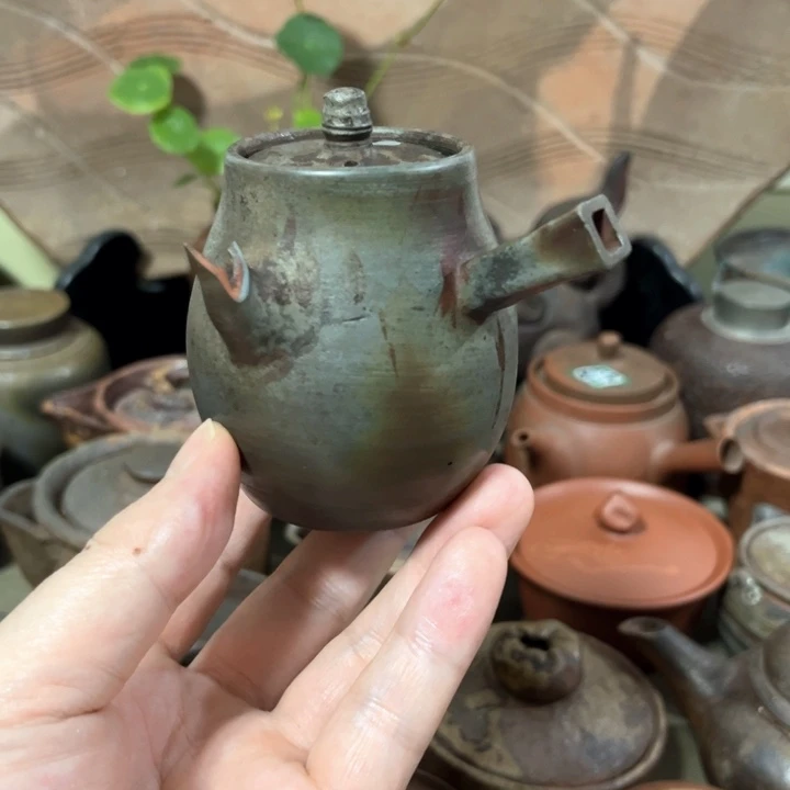 瓷片备前。    侧把