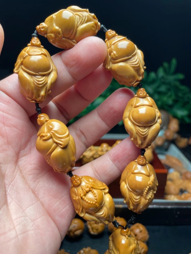 物件橄榄核暖阳弥勒手工雕刻大肚弥勒