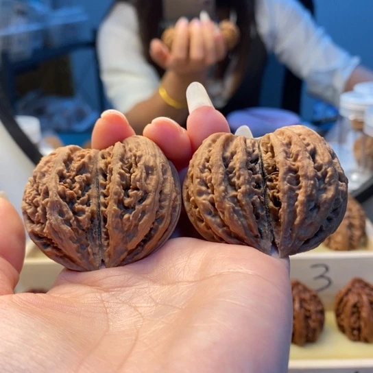 桃核把件双棒楸子44