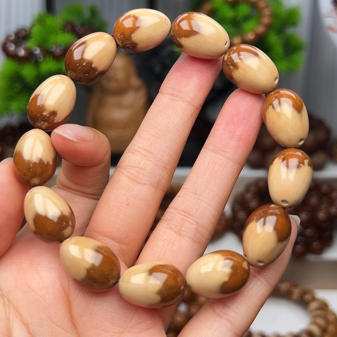 紫金鼠手串半实心花皮枣珠