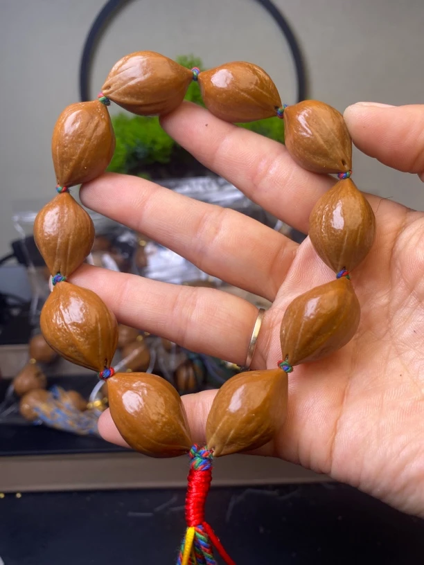 橄榄核雕1.7梅林铁黑金刚10粒手持