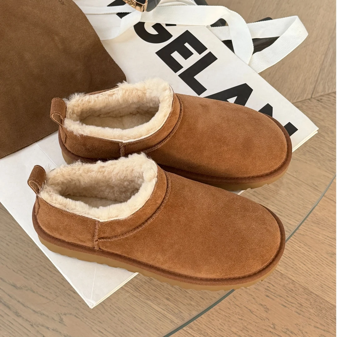 诗歌兰真皮女鞋2025冬季新款羊皮毛一体加绒保暖棉鞋女平底雪地靴