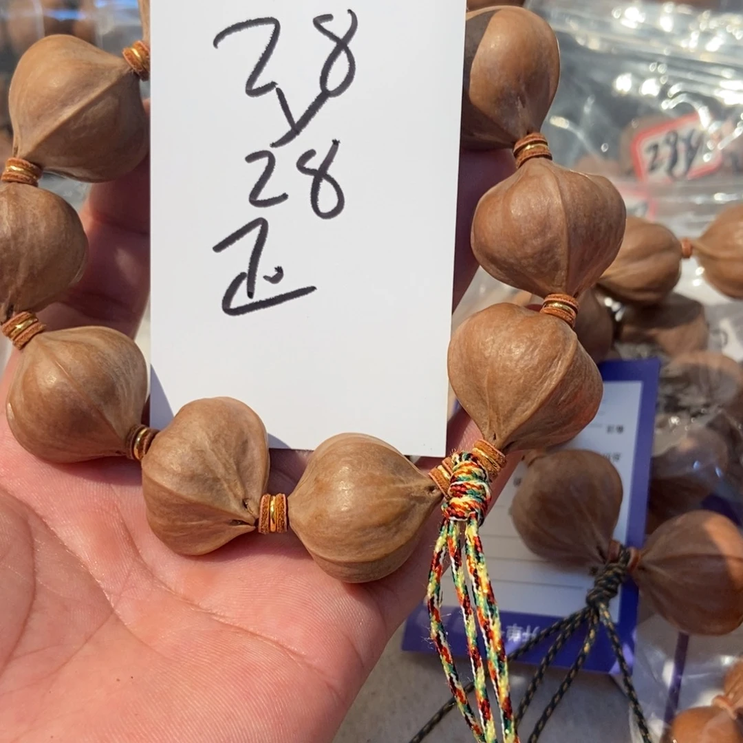 张***华吊坠橄榄核橄榄橄榄