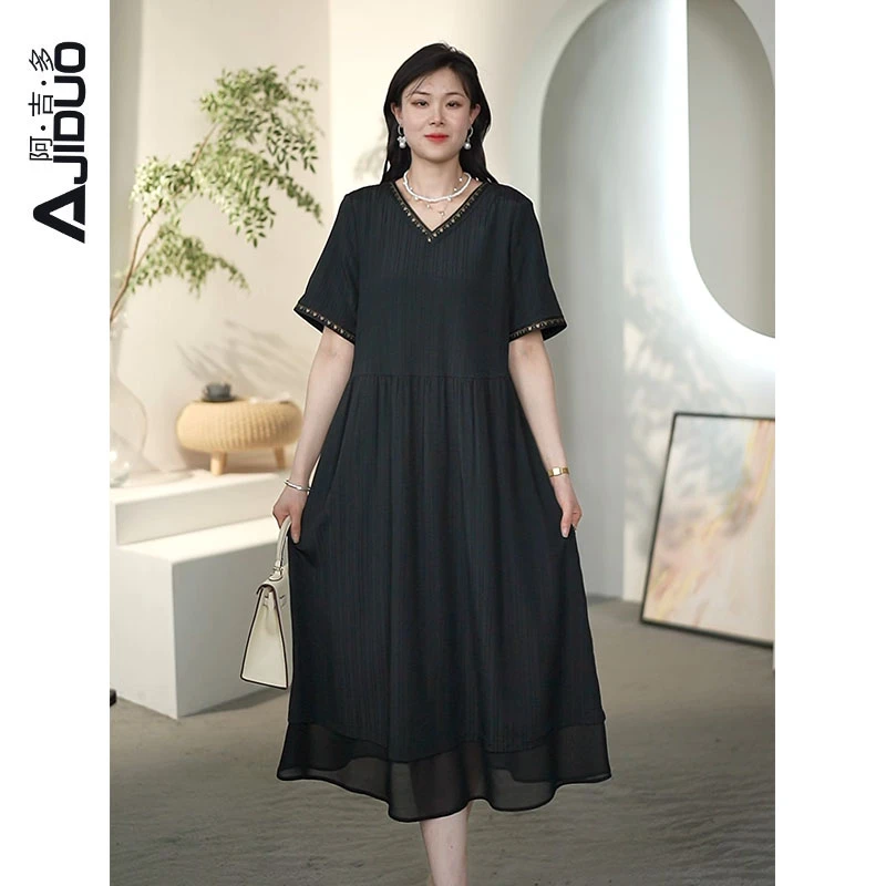 黑色肌理感显瘦刺绣连衣裙2025夏季新款宽松大码赫本风百搭小黑裙