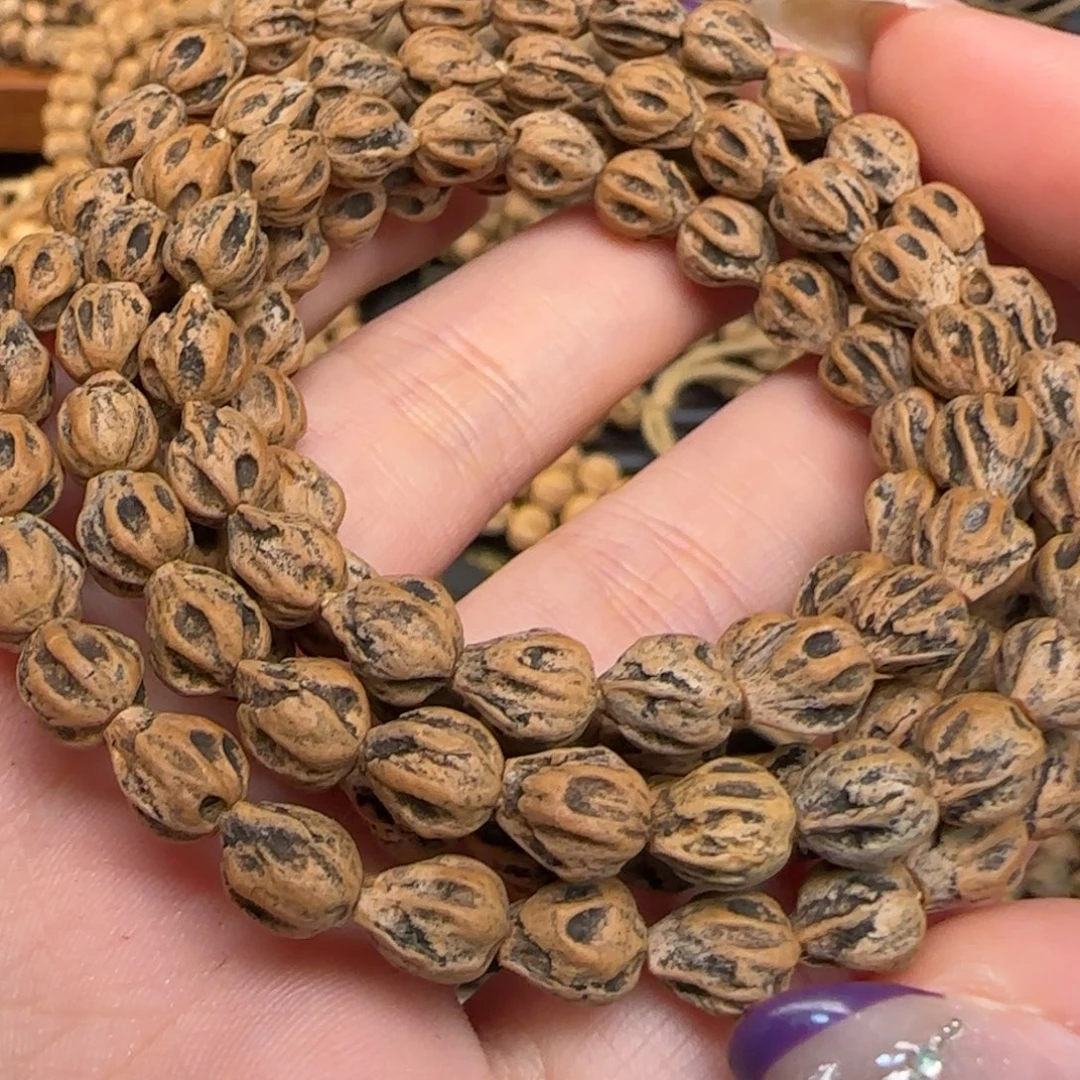 哈***弄柏香籽/百香籽吊坠