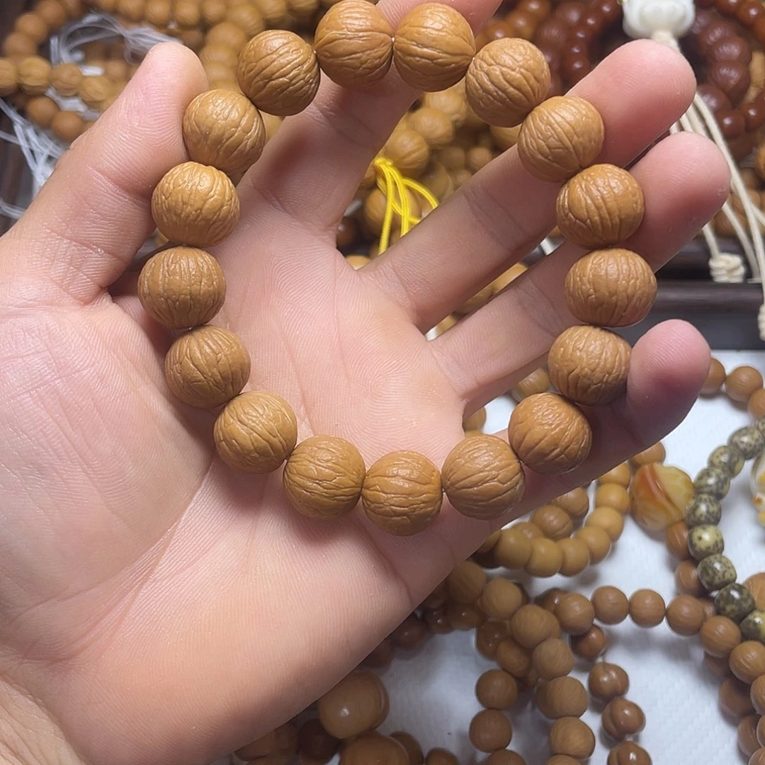 吊坠猴头核桃磨盘凤羽