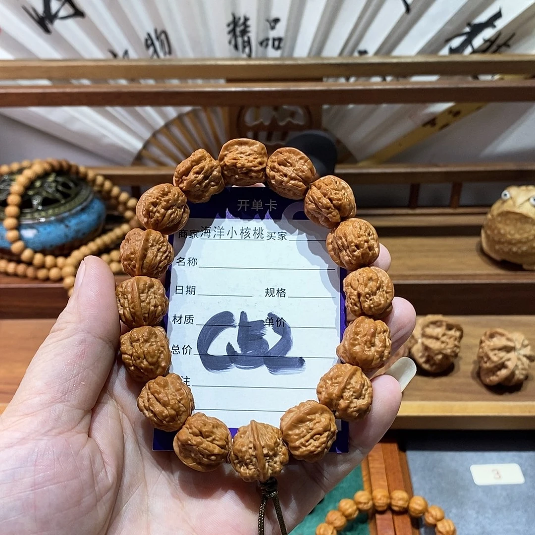 ****林文玩核桃手串17金蟾