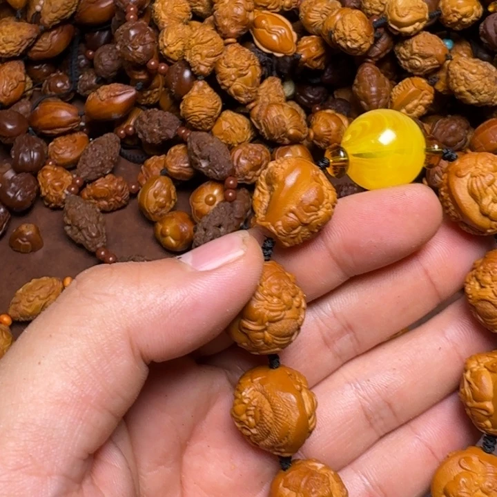 把件橄榄核你的电话怎么