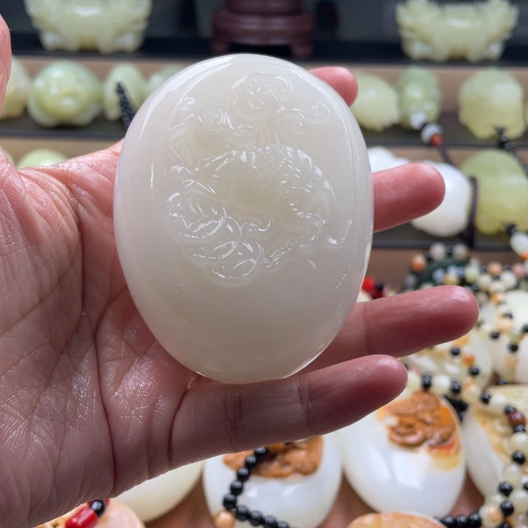 锦****石材古青石手把件