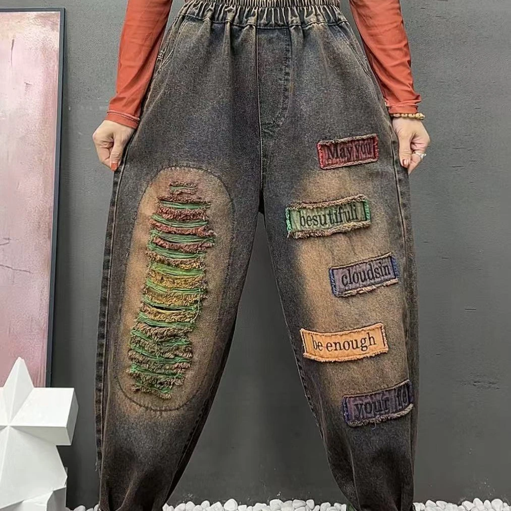 春秋女装新款贴布字母喷彩水洗软牛仔裤休闲松紧腰显瘦时尚哈伦裤