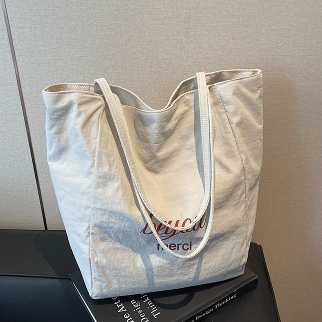 韩版简约秋季运动单肩帆布包2025新款休闲百搭大容量通勤托特包