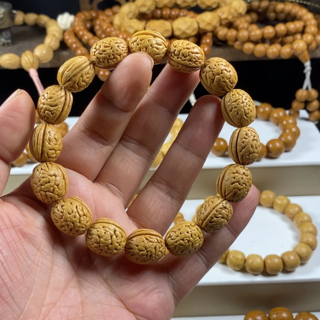 没***镜桃核吊坠沈阳钱袋子原皮单圈