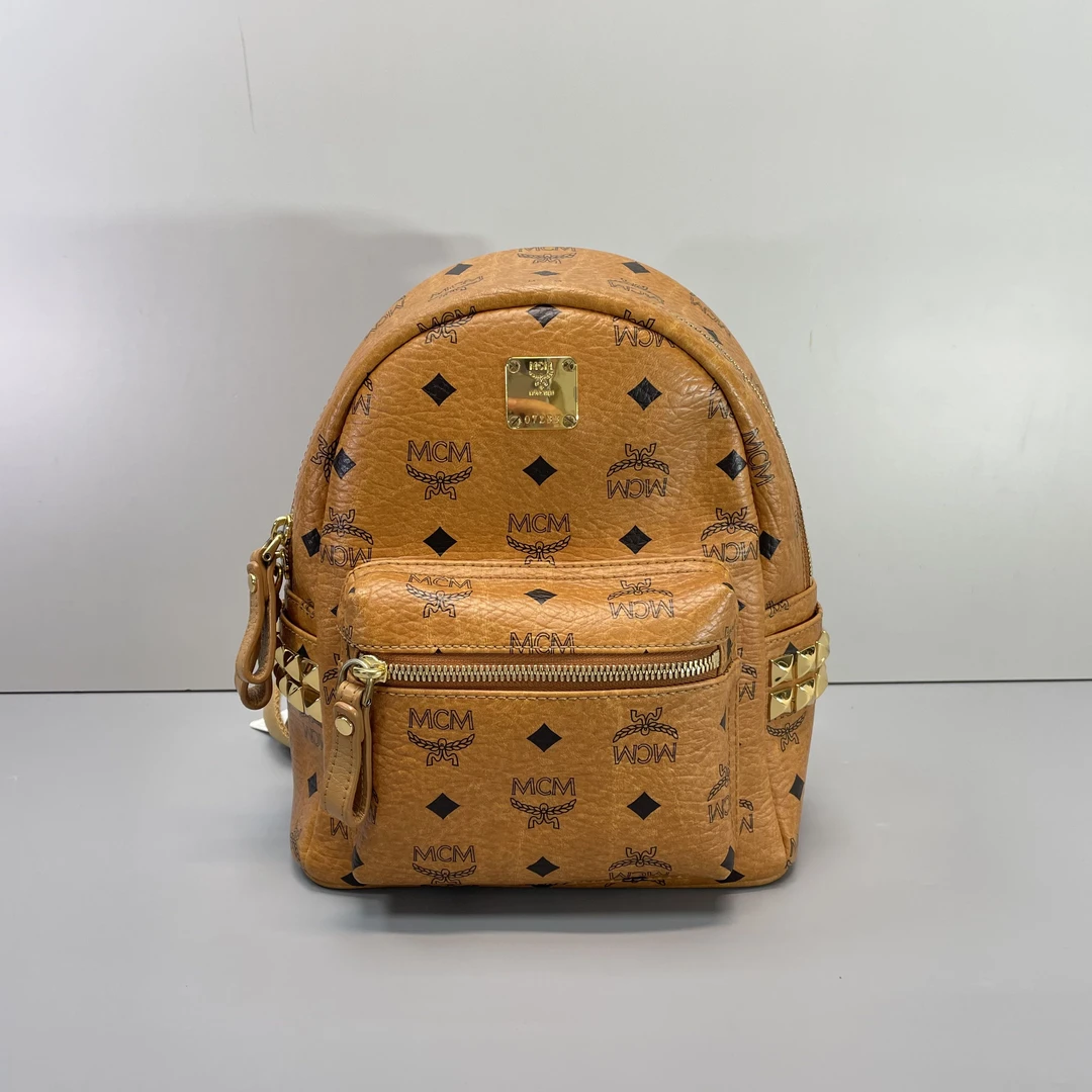 95新 MCM 媚姐/mcm干邑色小号双肩包22*26*10cmG030602