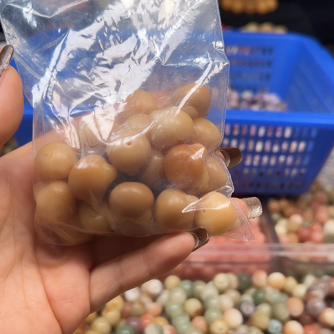 吴***≦菩提根/象牙果手串瑕疵熊头30颗有裂