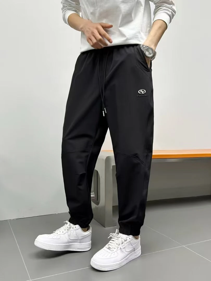 18-138潮透气卫裤刺绣夏季百搭速干裤休闲裤宽松弹力耐磨男裤