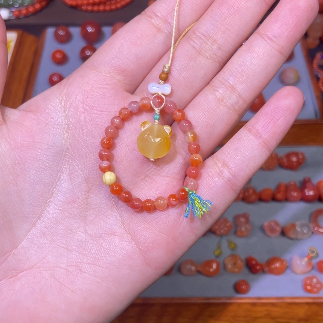 南红玛瑙未镶嵌指环款蜜蜡熊头手机挂